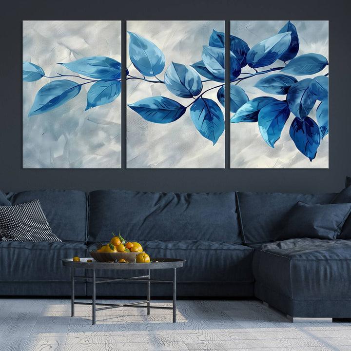 A Blue Leaf Abstract Wall Art Canvas Print, featuring a textured background and gallery-quality finish, is displayed.