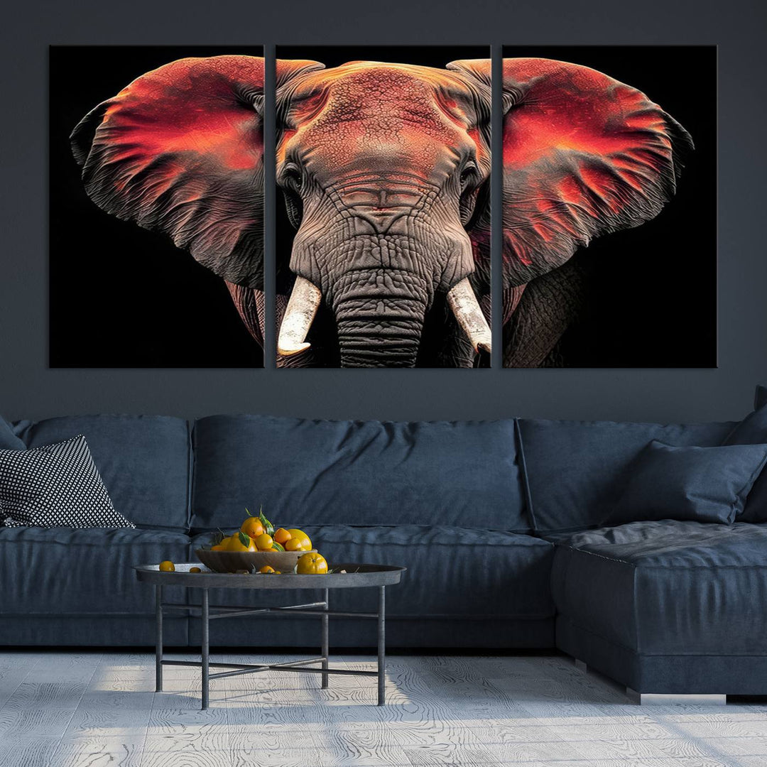 The Elephant Wall Art Canvas Print, featuring vibrant red and black tones, is a stunning artwork printed on museum-quality canvas. It comes with a UV-protective coating.