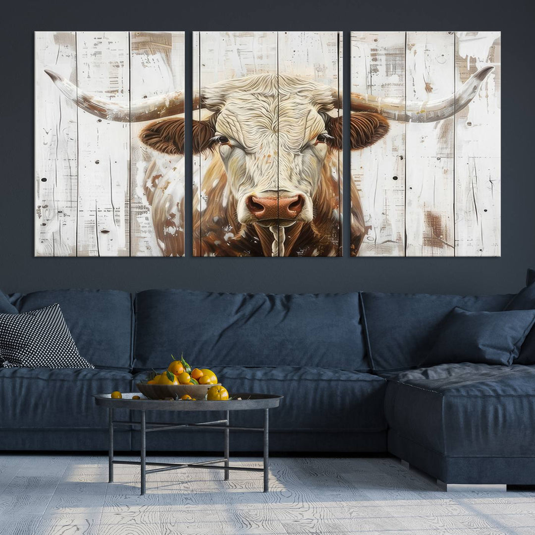 The dimly lit room is enhanced with Western charm by the Rustic Longhorn Bull Wall Art Canvas Set—Western-Inspired Farmhouse Décor, elegantly displayed on the wall.