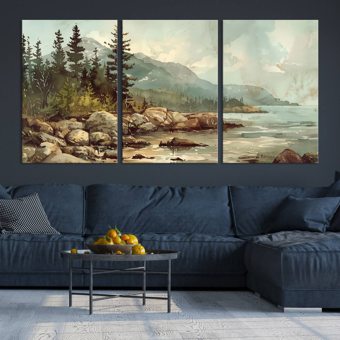 The living room features a breathtaking three-panel Abstract Acadia National Park Wall Art Canvas Print, which beautifully captures the rocky Maine coastline with trees and mountains.