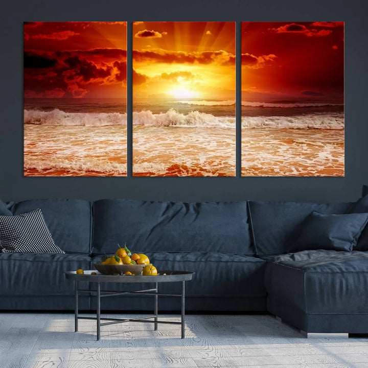 In a modern living room, the vibrant "Wall Art Canvas Perfect Sunset Turns Colour of Sea and Sky to Red," printed on museum-quality canvas, stands out. A floor lamp casts warm light over the ready-to-hang artwork, which includes a UV-protective coating to ensure lasting brilliance.