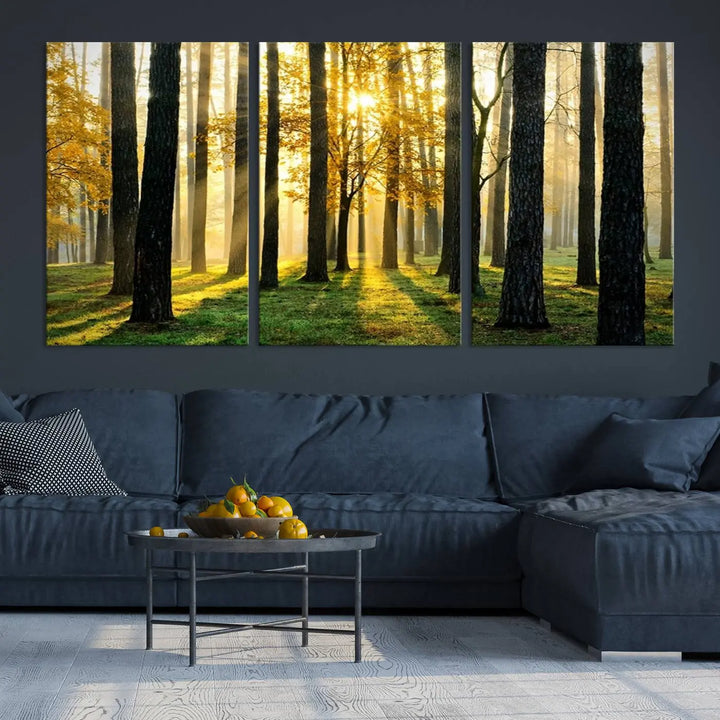 The living room is enhanced by the "Wall Art Landscape Canvas Print Tall Trees in Forest at Sunset" on museum-quality canvas. This triptych, complete with a UV-protective coating, is ready to hang and adds an artistic touch to the space.