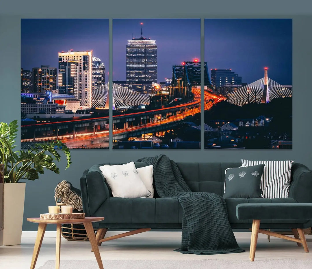 The "Boston City Lights Night Skyline Cityscape View" artwork on the wall showcases a brightly lit bridge at night. It is displayed on museum-quality canvas with a UV-protective coating.