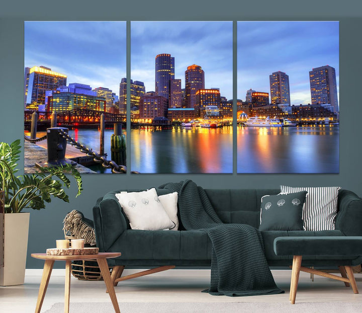 The Boston City Lights Sunset Cloudy Blue Skyline Cityscape View Wall Art Canvas Print embellishes a contemporary living room. This gallery-wrapped canvas set guarantees museum-quality canvases to enhance any space.