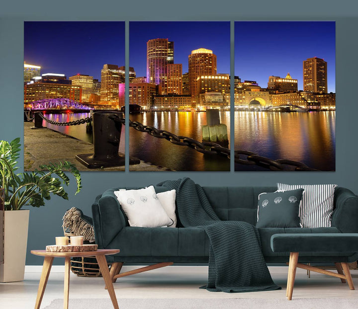 The "Boston City Night Skyline Cityscape View Wall Art Canvas Print" beautifully portrays a stunning triptych of a city skyline illuminated against the night sky, elegantly reflected in the river below. These museum-quality canvases are gallery wrapped to ensure an elegant presentation that enhances any space.