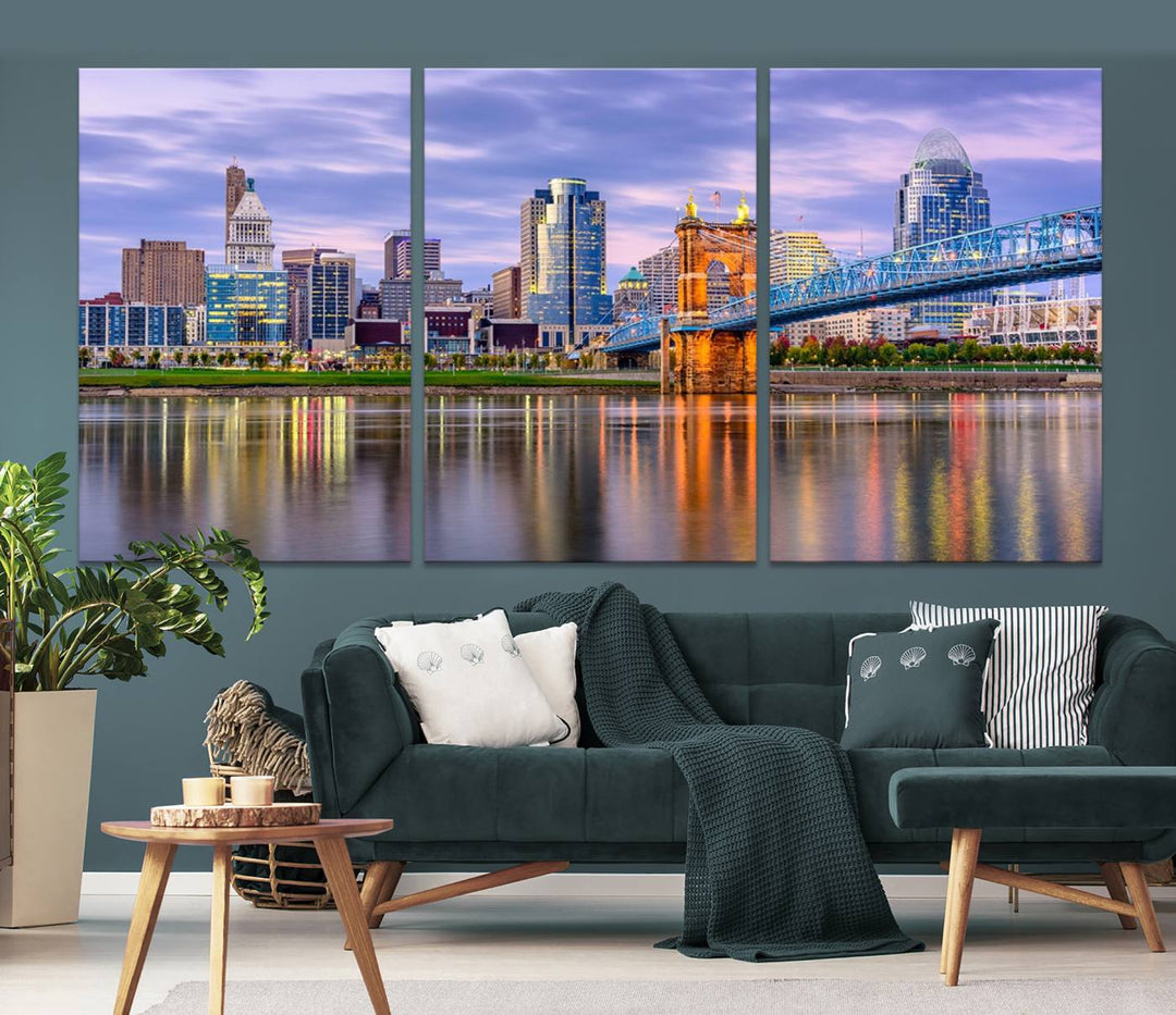 The wall art titled "Cincinnati City Lights Sunset Purple Cloudy Skyline Cityscape View" is beautifully printed on museum-quality canvases with a UV-protective coating and is ready to hang.