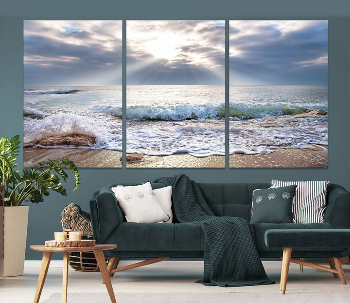 Sunset At The Beach Wall Art Canvas Print, showcasing a triptych of a tranquil ocean view with waves and sun rays, is printed on museum-quality canvas with UV-protective coating. Enjoy this artistic elegance with free shipping.