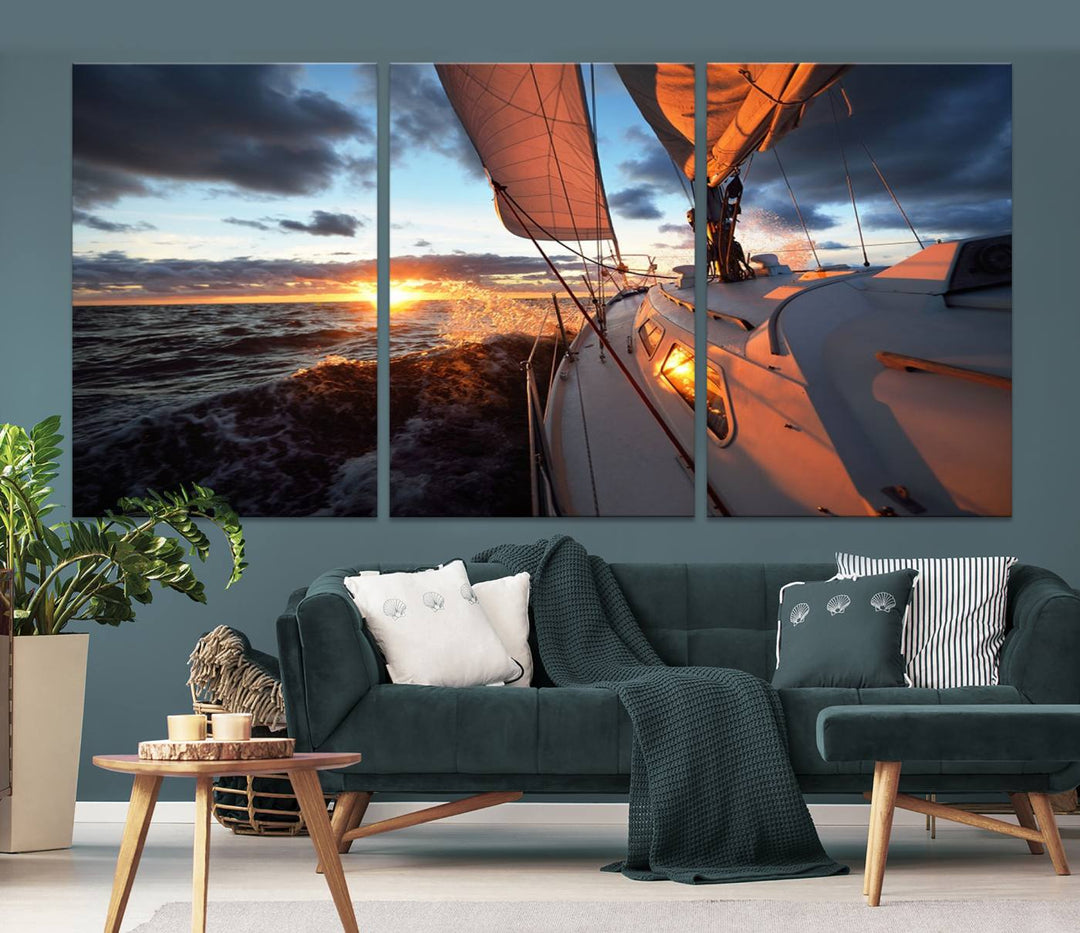 The modern living room is adorned with the Ocean Sunset Sailboat Wall Art, a triptych crafted on museum-quality canvas featuring UV-protective coating for lasting vibrancy.