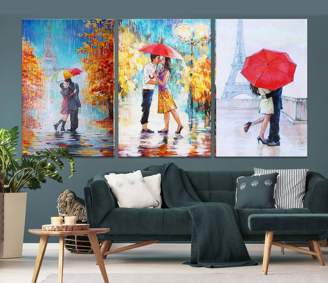 A triptych of the "Love in Paris Wall Art Canvas Print" showcases a couple with an umbrella in romantic settings. This artwork is crafted on museum-quality canvas and features a UV-protective coating for peace of mind. It also comes with the added convenience of free shipping.