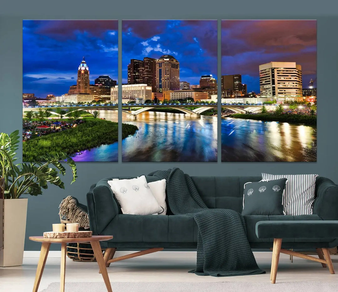 Columbus City Lights Night Bright Blue Cloudy Skyline Cityscape View Wall Art Canvas Print, gallery wrapped on museum-quality canvas, reflecting on a river.