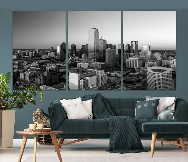 A modern living room showcases the Dallas City Lights Skyline Black and White Wall Art Cityscape Canvas Print. This gallery-wrapped piece offers a sleek finish and is crafted from museum-quality pollycotton. It features a UV-protective coating to ensure lasting vibrancy.