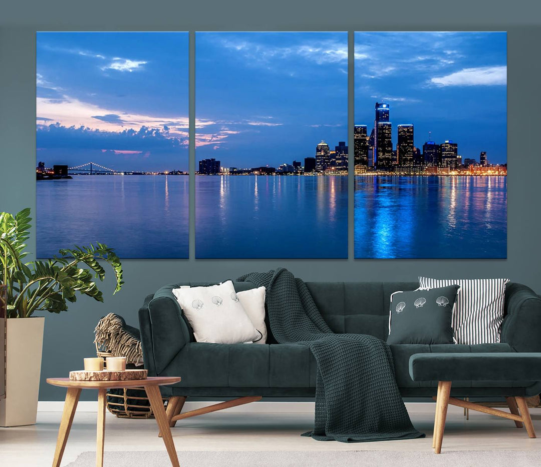 The "Detroit City Lights Night Blue Cloudy Skyline Cityscape View" wall art, displayed on museum-quality canvases, is split into three gallery-wrapped panels.