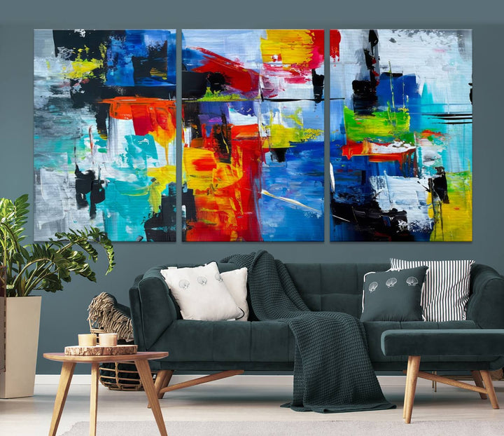 Three Colorful Abstract Wall Art Canvas Prints feature vibrant colors on museum-quality canvas and are finished with a UV-protective coating. Their ready-to-hang design allows for effortless transformation of your space.