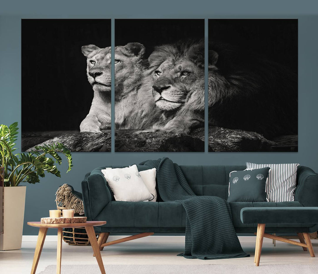 The elegant wildlife portrait, "Lion Couple Canvas Wall Art Print," featuring a black and white depiction of a lion family, majestically decorates the living room wall.