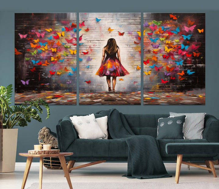 A vibrant artwork titled "Graffiti Wall Art Canvas Print Girl Butterfly Graffiti Abstract Canvas Print" is displayed above the couch. This gallery-wrapped masterpiece, printed on museum-quality canvas, features a UV-protective coating to preserve its vivid beauty.