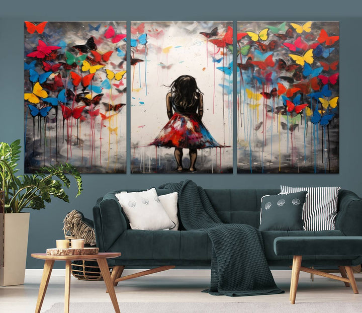 The Girl Butterfly Graffiti Abstract Canvas Print, featuring a vibrant depiction of a girl surrounded by butterflies on museum-quality canvas, is displayed prominently.