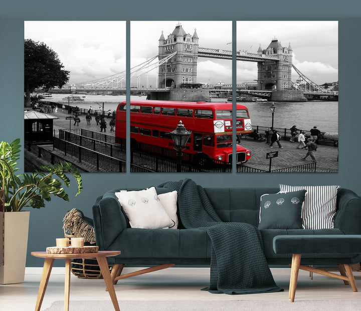 The London Red Bus and Bridge Wall Art Canvas Print showcases a red London bus in front of Tower Bridge, beautifully presented as a gallery-wrapped canvas. This striking image is divided into three panels, delivering a museum-quality display that's ready to hang.