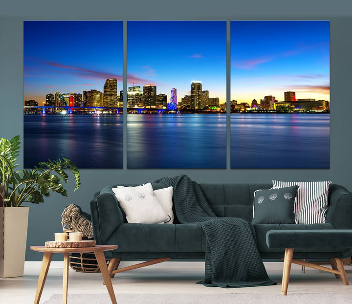 The living room features a Miami City Wall Art Canvas Print—a gallery-wrapped triptych displaying a city skyline at dusk, adding museum-quality elegance to the space.