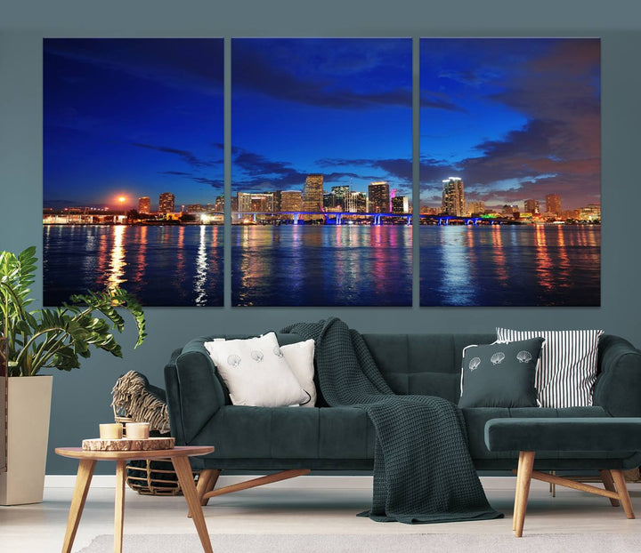 A large Miami City View Wall Art Canvas Print featuring the Miami City Skyline Panorama at night is displayed above the dresser.