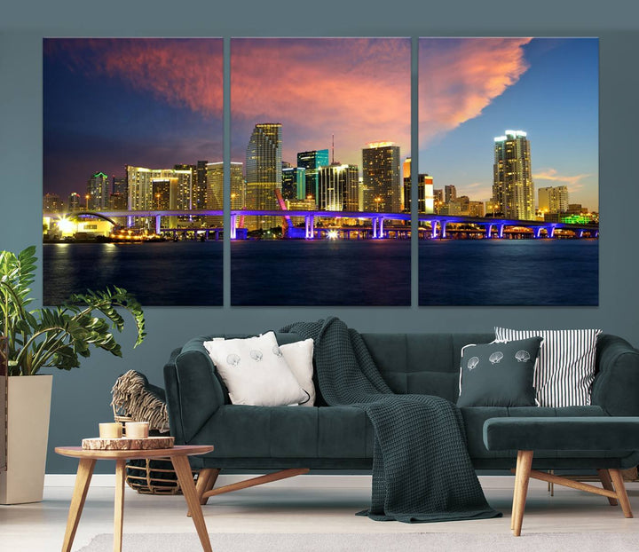 The modern living room is enhanced by the "Miami City Wall Art Canvas Print," a stunning triptych portraying a city skyline at sunset. These canvases are gallery wrapped and made from museum-quality materials, featuring a UV-protective coating to ensure lasting vibrancy.