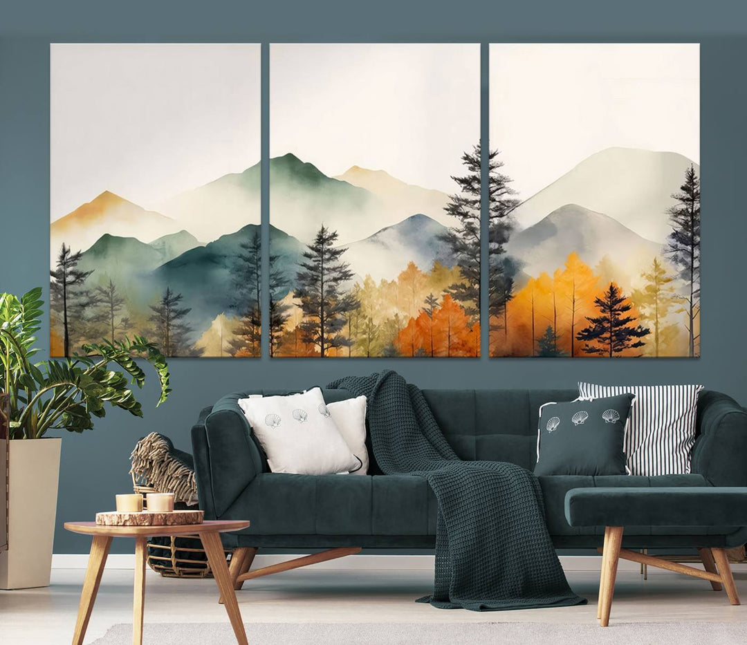 The Abstract Watercolor Mountains and Trees Autumn Wall Art, crafted on museum-quality canvas, decorates the space with its stunning triptych design. This wall art features autumn-colored mountains and trees, expertly gallery wrapped for a seamless and elegant addition to your living room.