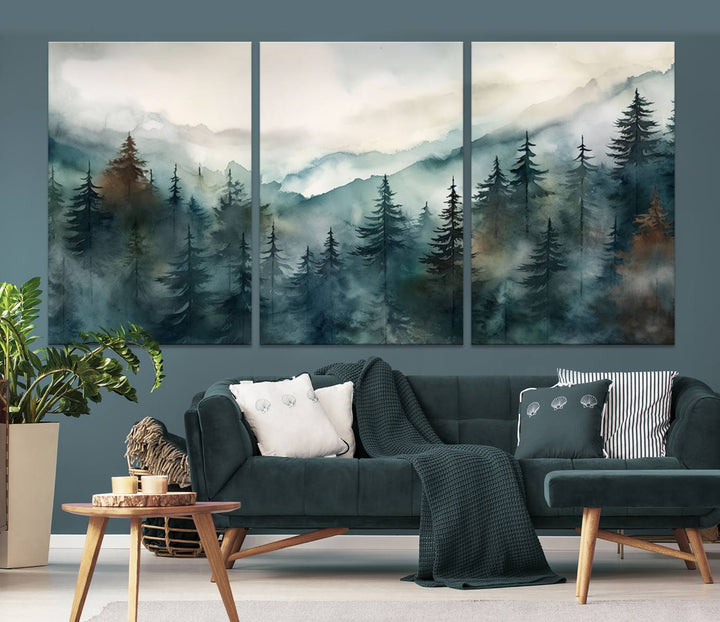 A set of Serenity Forest Wall Art Canvas prints, showcasing foggy mountain landscapes, is displayed in the living room.