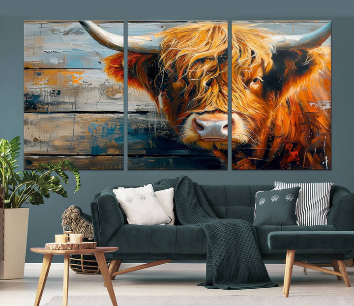 The Highland Cow Abstract Canvas Wall Art, a bold piece of farmhouse rustic decor, adds charm to the modern living room.