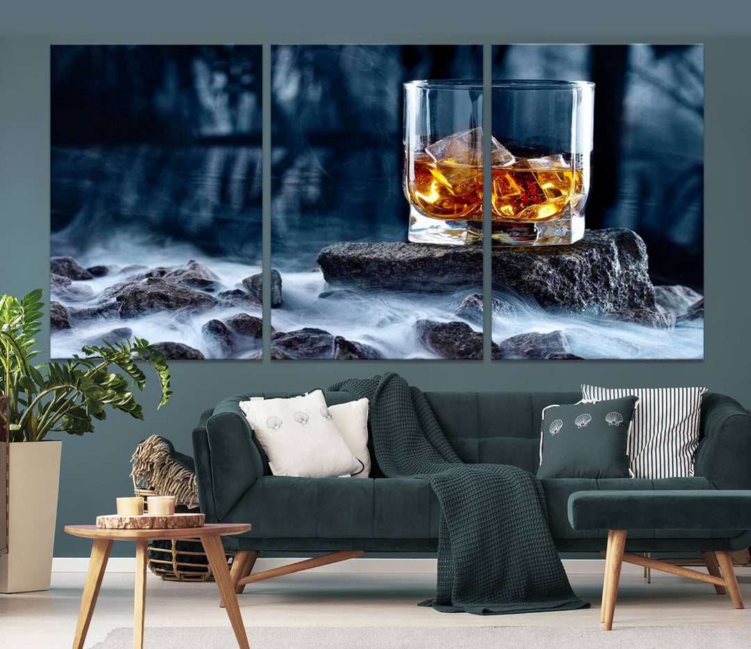 The Whiskey Ice Wall Art Canvas Print, a triptych featuring a glass of whiskey on the rocks, is crafted with a gallery-quality finish on premium canvas.