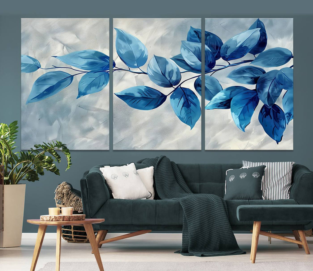 A Blue Leaf Abstract Wall Art Canvas Print, featuring a textured background and gallery-quality finish, is displayed.