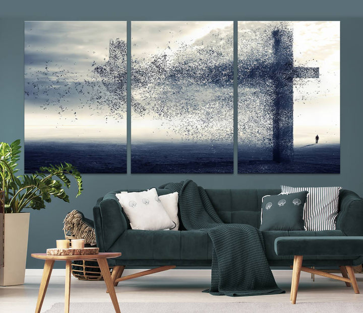 The "Jesus and the Fading Cross – Symbol of Faith" framed canvas print beautifully depicts a cross formed by birds against a moody sky above an ocean. This piece of Christian wall art infuses spirituality into the minimalist space.