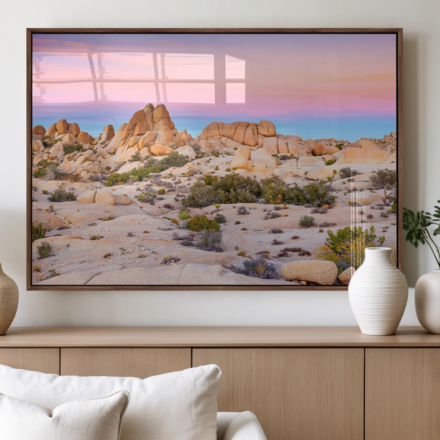 A breathtaking desert landscape featuring rugged rock formations under a vibrant pastel sunset sky, capturing the warmth and serenity of a Southwestern wilderness.