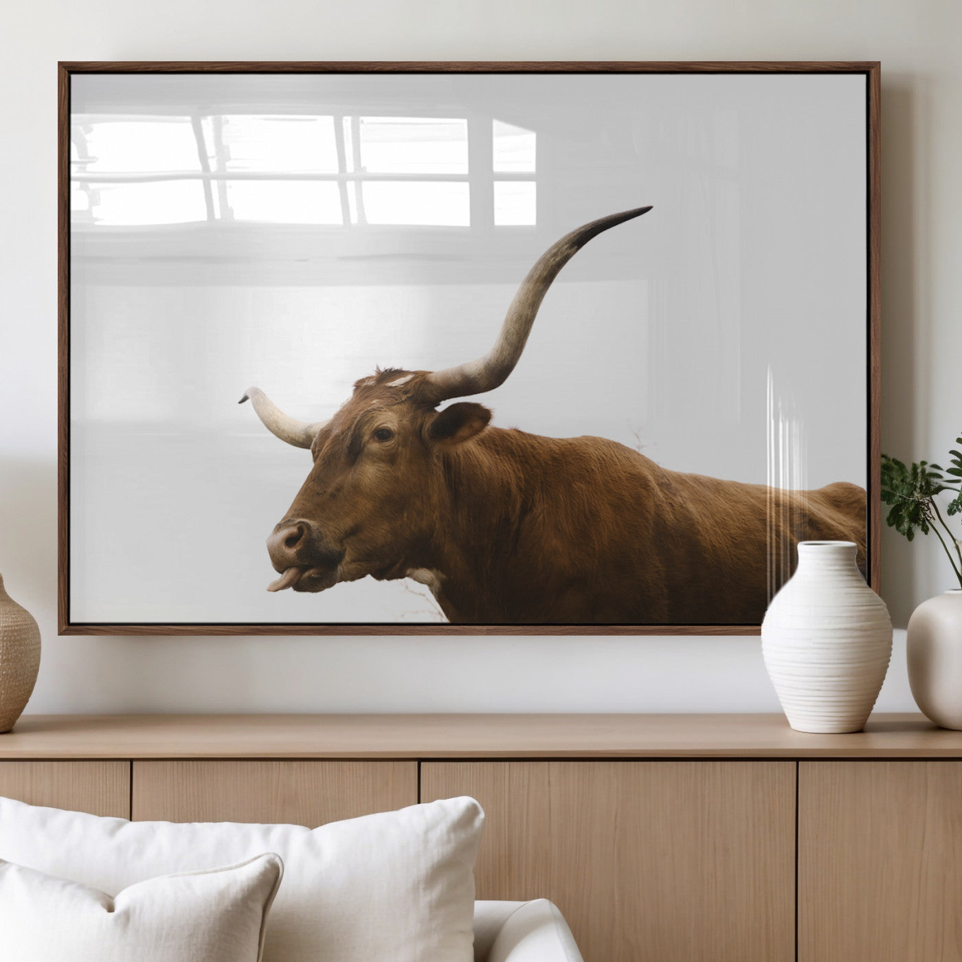 Side view of a brown Longhorn cow with curved horns on white background, perfect for rustic farmhouse or western-style home decor.