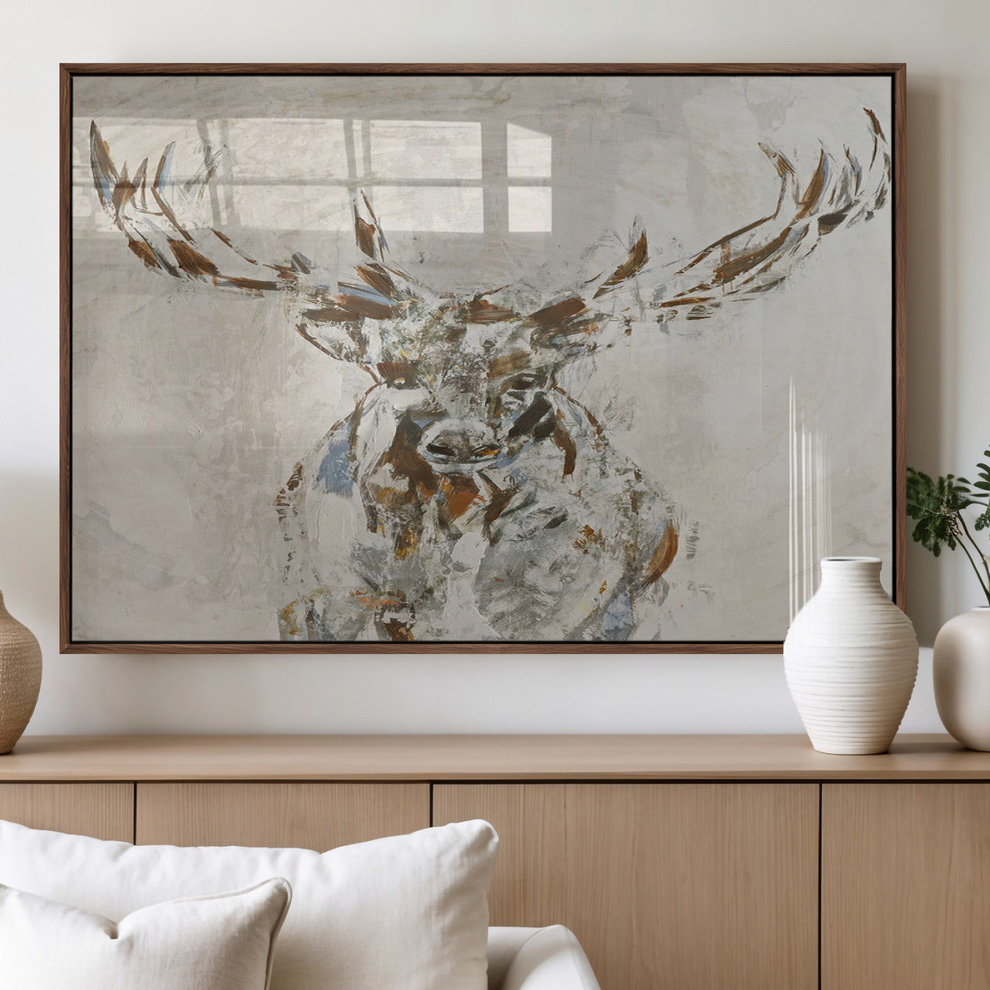 Abstract painting of a deer with antlers in neutral earth tones, ideal for modern rustic or lodge-style living room wall decor.