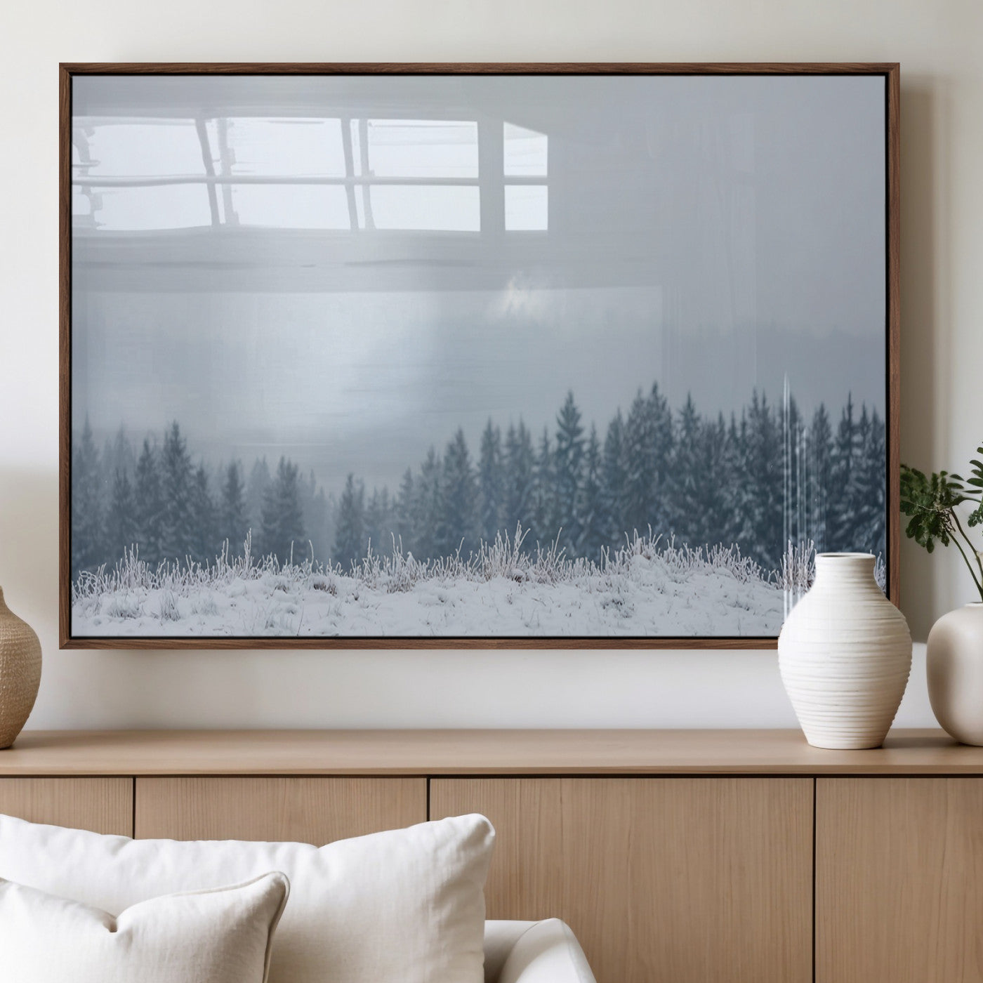Snow-covered forest under misty sky, soft light breaking through clouds, ideal for minimalist or Nordic-inspired home decor.