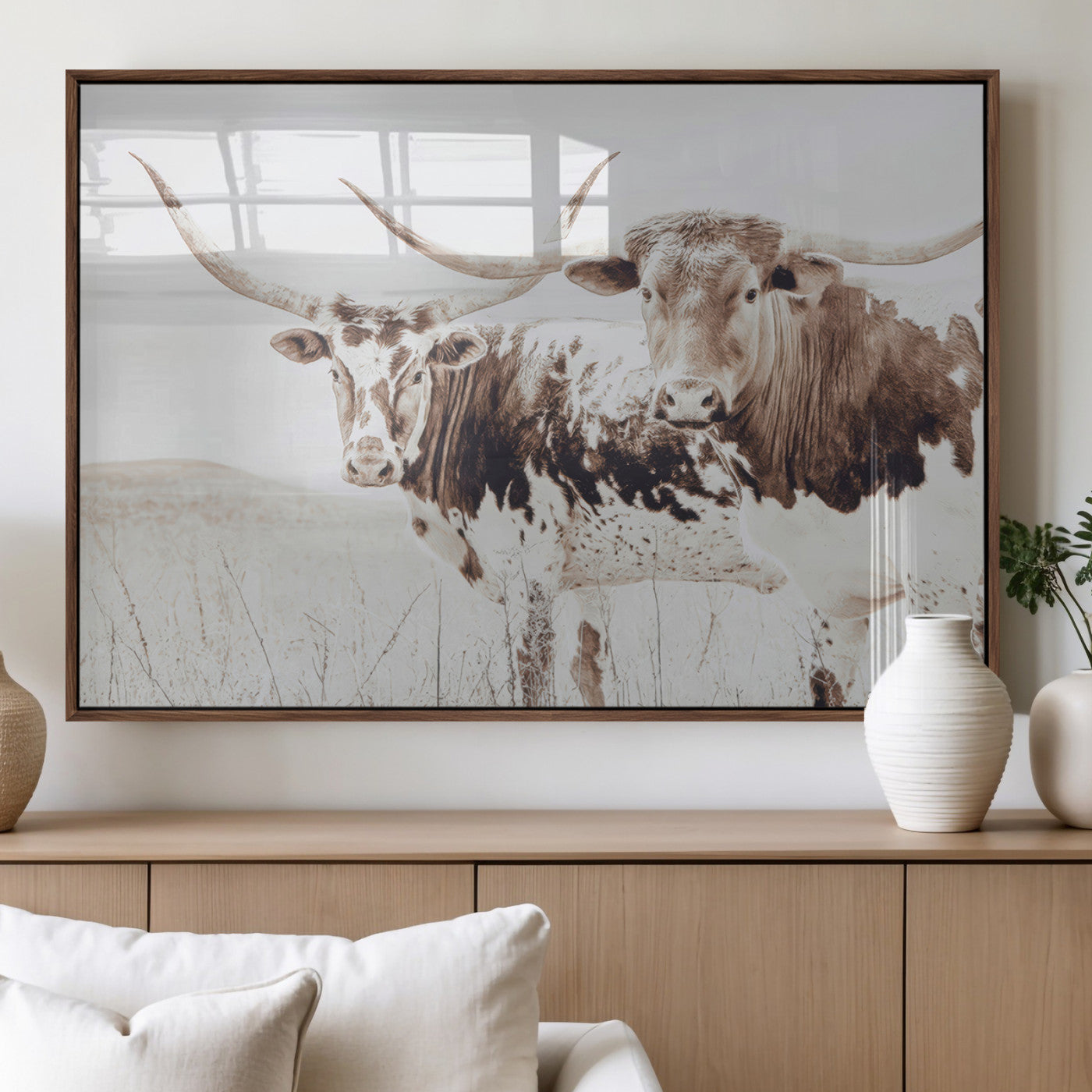 Two longhorn cows standing in a sepia-toned pasture with soft light, ideal for rustic or farmhouse-themed neutral wall decor.