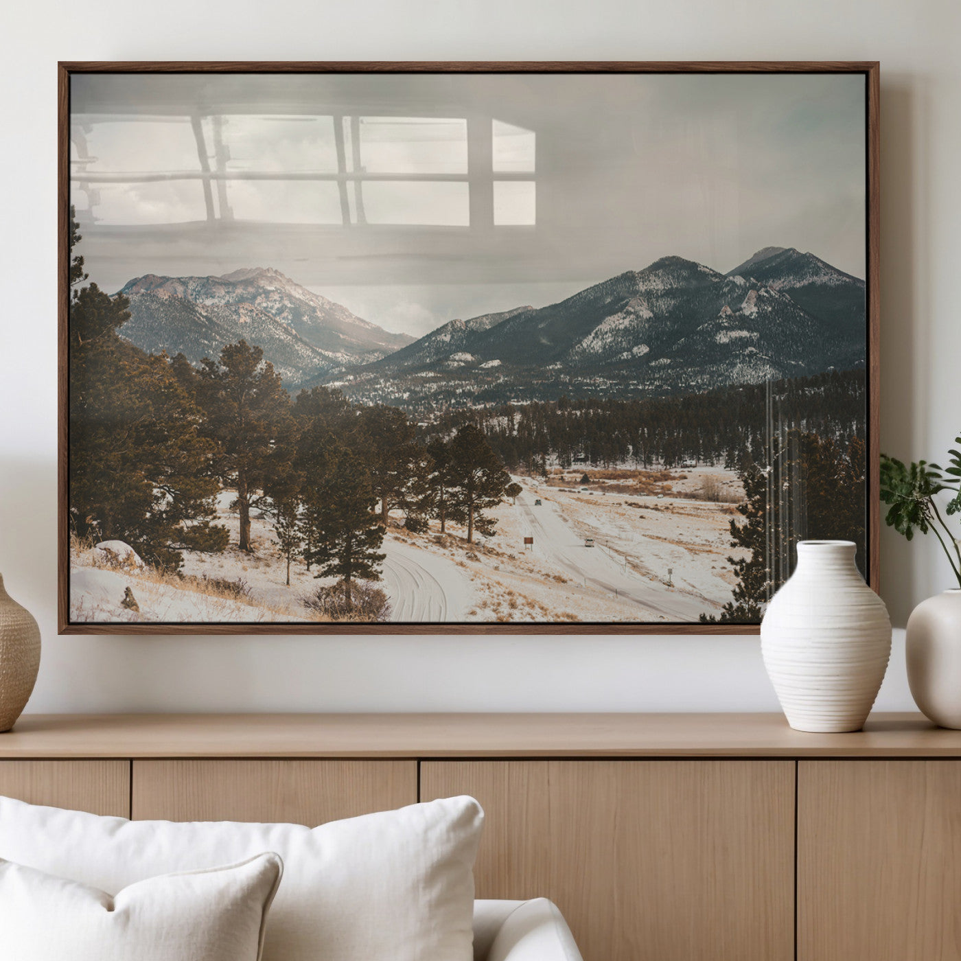 Snow-covered mountains with pine trees and a winding path, creating a serene and rustic winter landscape perfect for cozy decor.