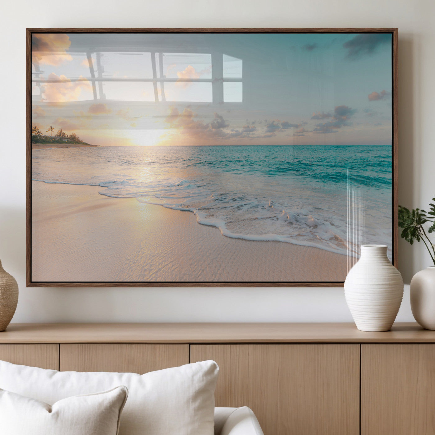 Golden sunset over a tropical beach with gentle ocean waves and soft white sand, creating a peaceful and relaxing coastal scene.
