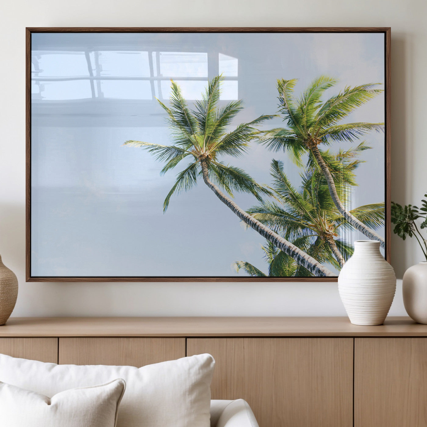 Tall palm trees swaying under a bright blue sky, capturing a tropical and minimalist beach vibe, perfect for coastal-inspired wall art.