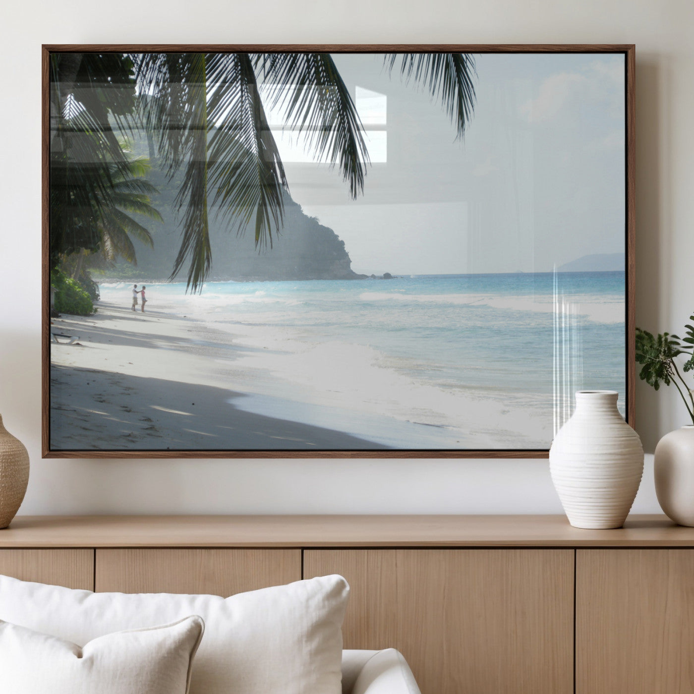 Tropical beach with palm tree shadows, white sand, and turquoise ocean waves, creating a serene and relaxing island escape atmosphere.
