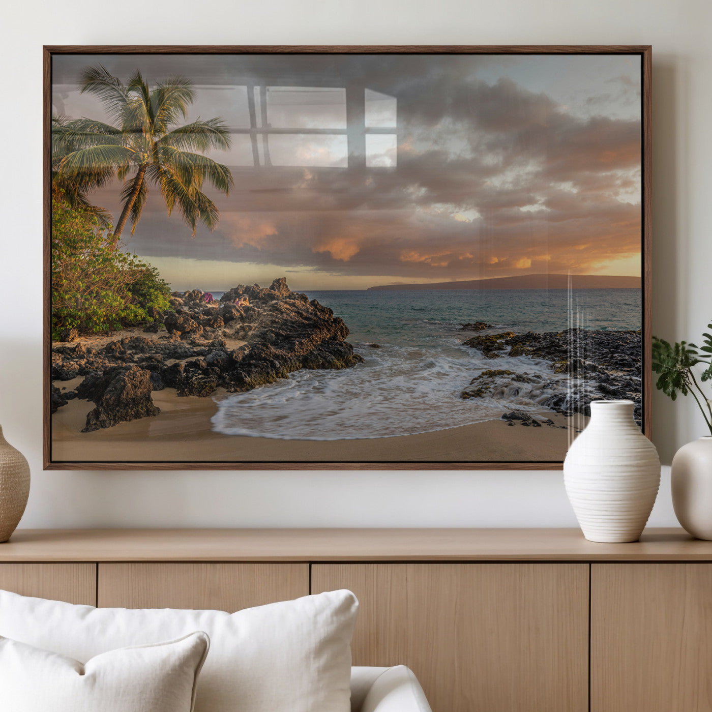 Golden sunset over a tropical beach with palm trees, rocky shoreline, and gentle ocean waves, perfect for coastal and island-inspired decor.