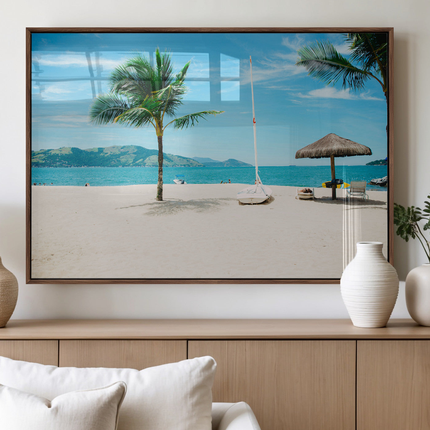 Tropical beach scene with palm trees, a white sailboat, and turquoise ocean waters under a bright blue sky, creating a peaceful summer vibe.