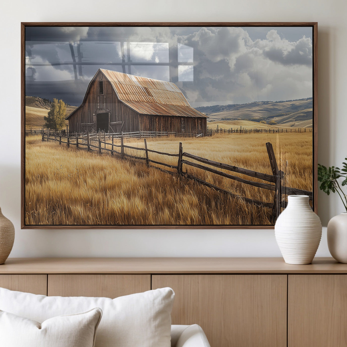 "Rustic barn surrounded by golden fields, a wooden fence, and dramatic storm clouds in the sky, capturing a serene countryside landscape."