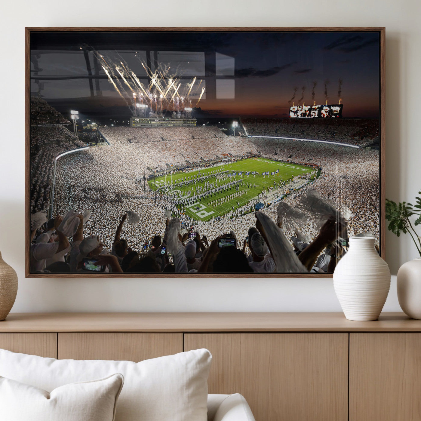 Panoramic view of a packed football stadium during a night game with a firework display and marching band performance – Wall Art Canvas Print.