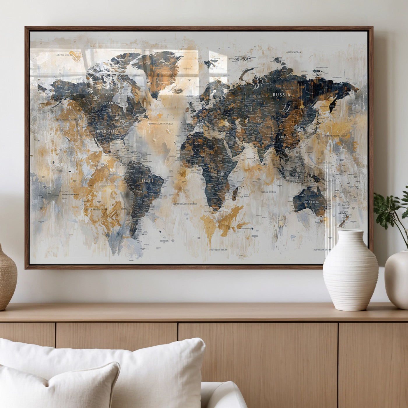 Artistic world map with textured brush strokes in shades of gold, navy blue, and white, showing continents and countries with an abstract, painterly effect.