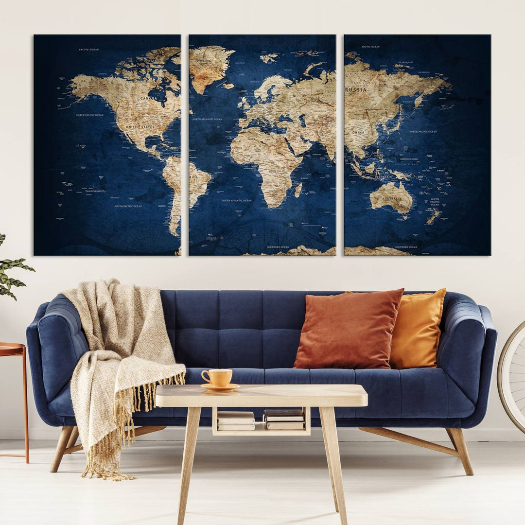 A triptych canvas print titled "Vintage Blue World Map Canvas Print - Classic World Map Design on Deep Blue Wall Art Print" adorns the wall, enhancing the decor with its antique style.