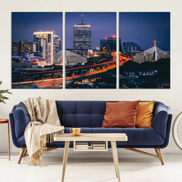 The "Boston City Lights Night Skyline Cityscape View" artwork on the wall showcases a brightly lit bridge at night. It is displayed on museum-quality canvas with a UV-protective coating.