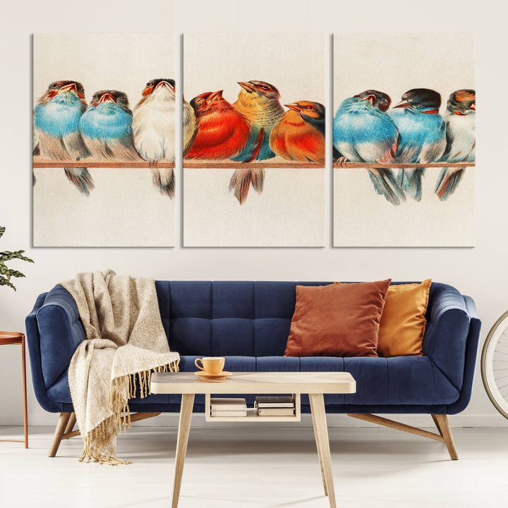 The Abstract Birds Wall Art Canvas Print, featuring a triptych of colorful birds perched on a branch, is printed on museum-quality canvas and equipped with a UV-protective coating and ready-to-hang design. This artwork adds vibrant elegance to your living space.