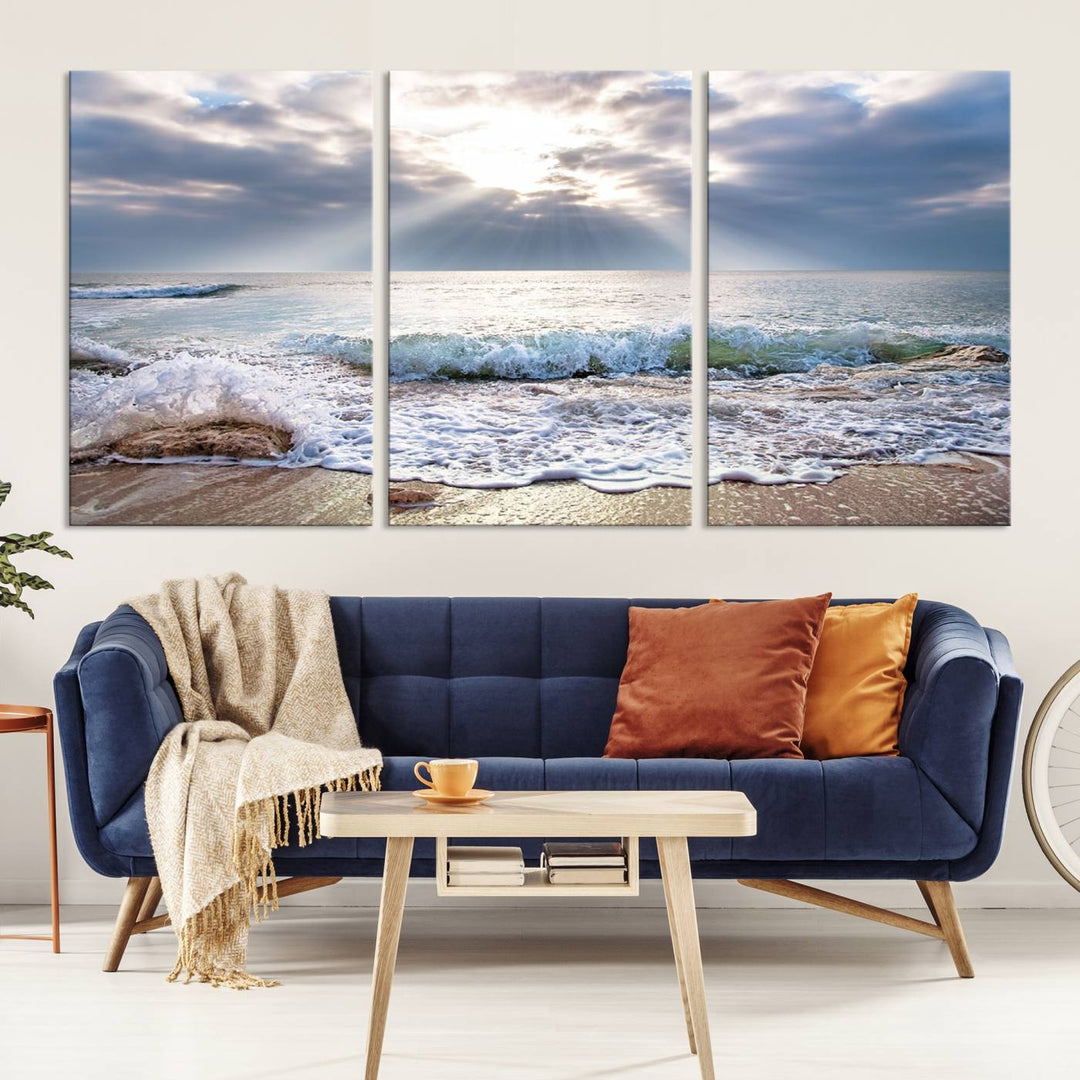 Sunset At The Beach Wall Art Canvas Print, showcasing a triptych of a tranquil ocean view with waves and sun rays, is printed on museum-quality canvas with UV-protective coating. Enjoy this artistic elegance with free shipping.