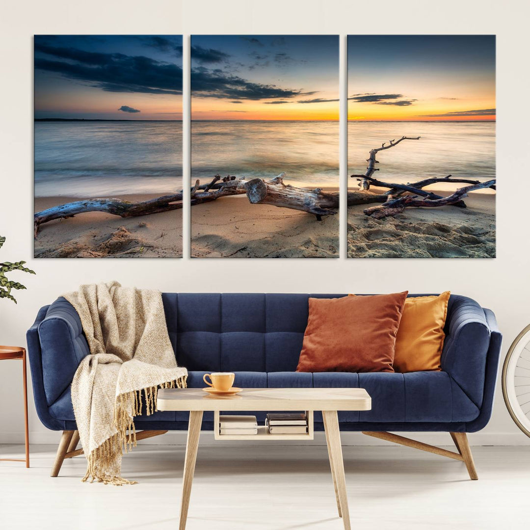 A captivating piece of Ocean Sunset Beach Wall Art Canvas Print, gallery wrapped, graces the gray wall.