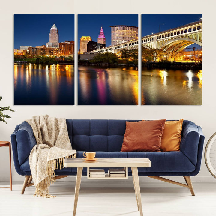 The "Cleveland Night Skyline Wall Art City Cityscape Canvas Print" is a striking feature in the room, showcasing a city skyline with a bridge reflecting in a river. Displayed on museum-quality canvas, it offers enduring beauty.